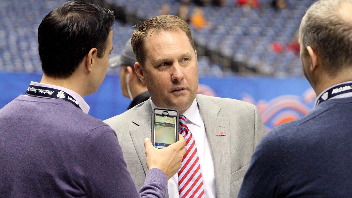 TIM ISBELL/SUN HERALD 
 Ole Miss coach Hugh Freeze is interviewed as his Rebel team arrives at the Superdome for tonight's All State Sugar Bowl in New Orleans, Friday, Jan. 1, 2016.