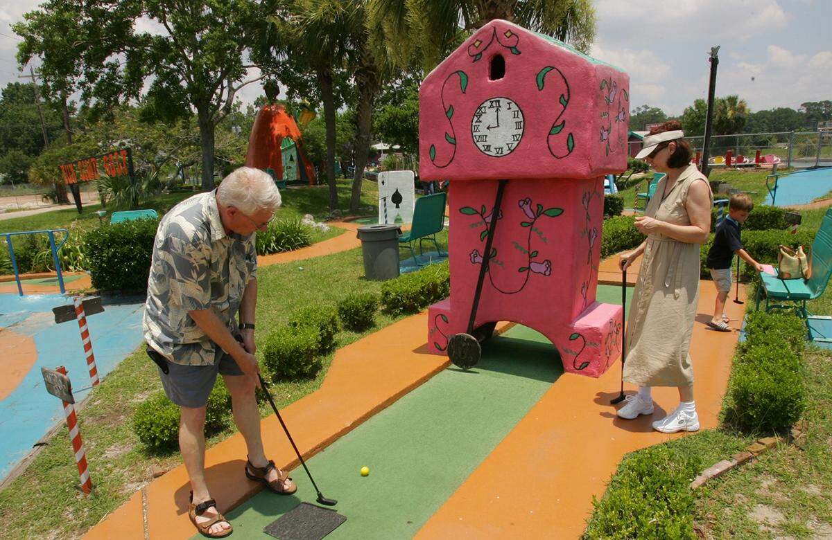 Every hole of mini golf, like this one at FunTime USA in July 2005, was an experience at the putt-putt courses in South Mississippi. Dinosaurs, Buddah and other characters were designed to draw locals and tourists in for a round. Most of those beachfront attractions were lost to time and Hurricane Katrina.
