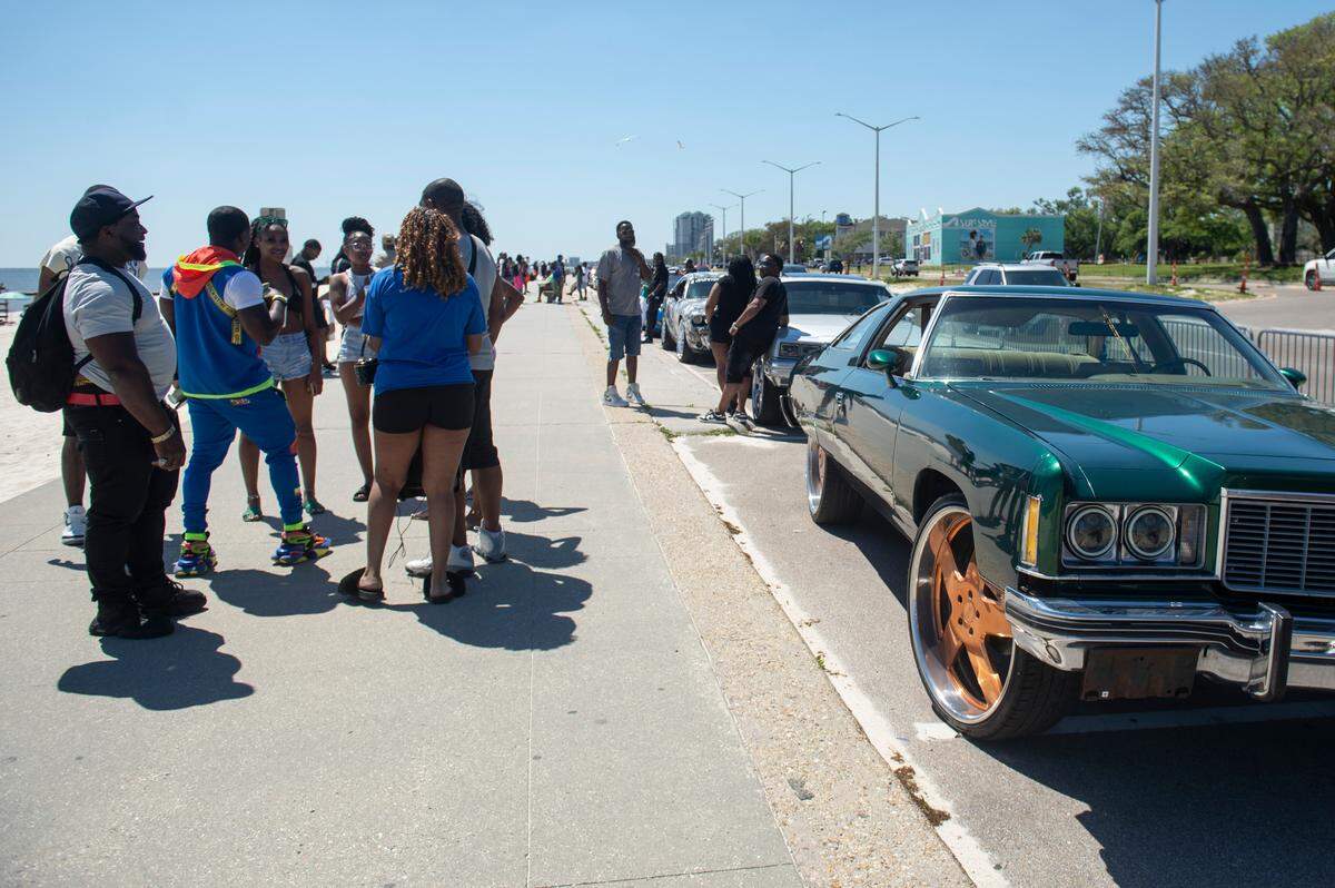 Crowds gather at Biloxi Beach during Black Spring Break on Saturday, April 12, 2025. Biloxi police say this year is the ‘chillest’ Black Spring Break they’ve seen.