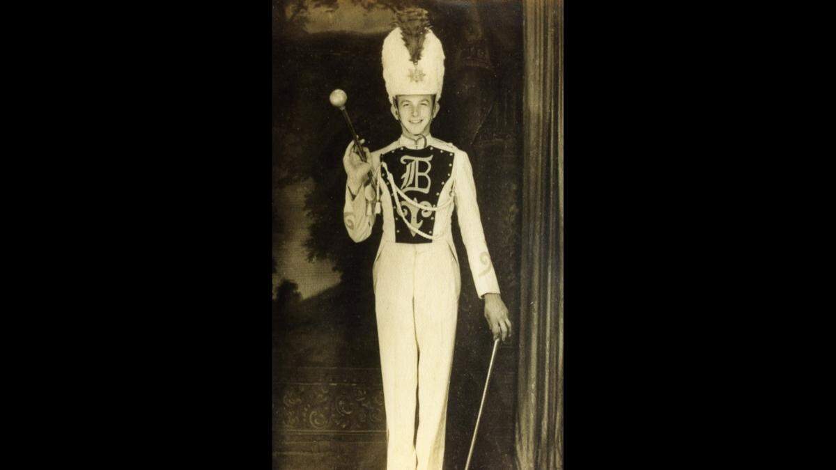 Victor Mavar Sr. as drum major at Biloxi High School