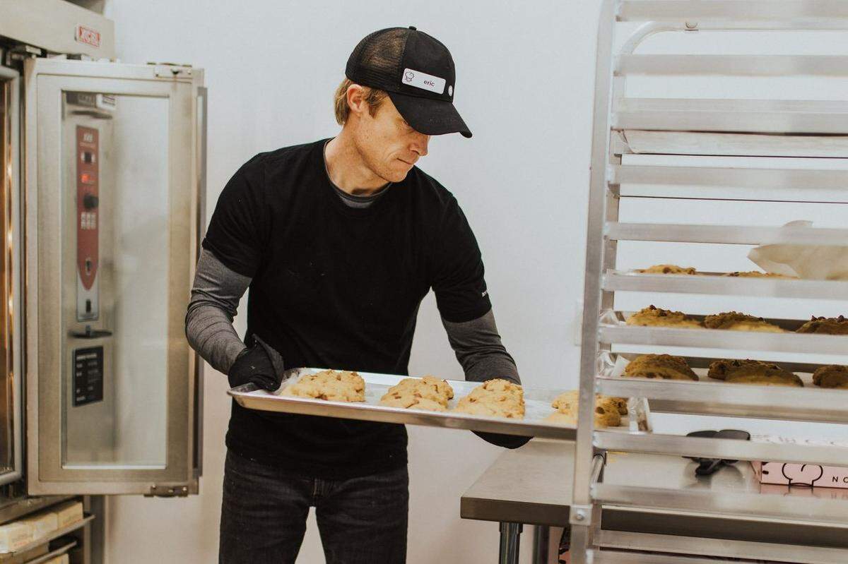 Milk chocolate chip cookies and dozens of other varieties are featured at Crumbl Cookies. One of the two South Mississippi locations is closing.