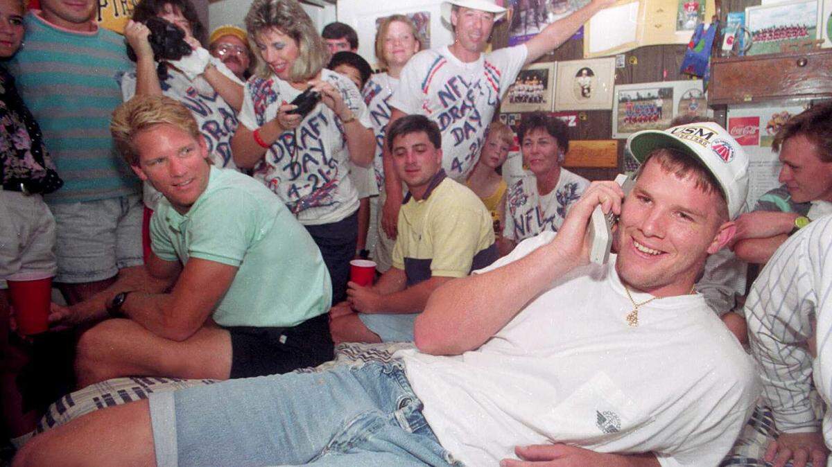 TIM ISBELL/SUN HERALD 
 Brett Favre talks to the Atlanta Falcons on NFL draft day April 21, 1991 in his bedroom. Favre, a quarterback at USM, was drafted in the second round by the Falcons and was the 33 player chosen in the draft.