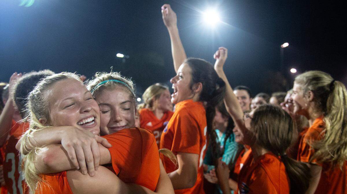 Members of the Gulfport girls soccer team celebrate after winning the 6A South State Championship game against Ocean Springs in Gulfport on Tuesday, Jan. 31, 2023. The team will advance to the state championship.