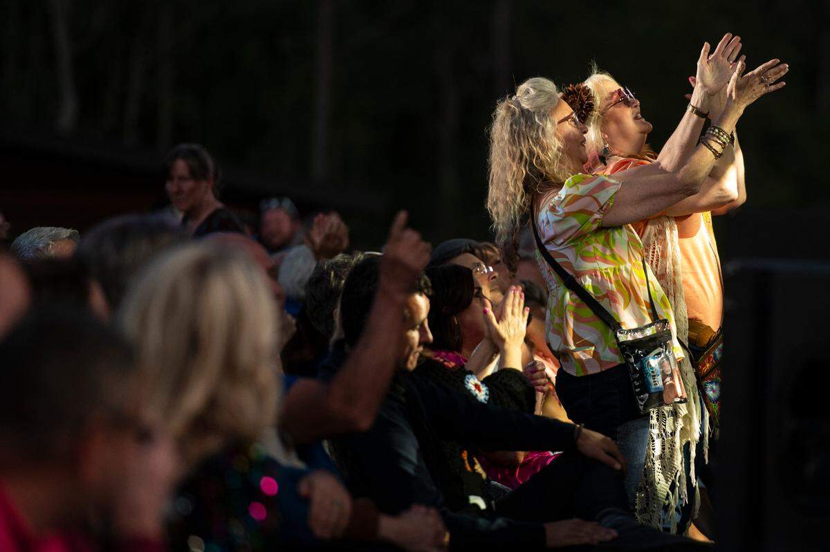 Fans dance and cheer during the KC and The Sunshine Band performance at the inaugural show at The Sound Amphitheater in Gautier on Friday, April 12, 2024.