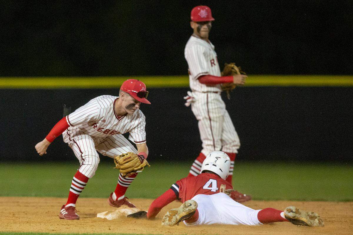 Biloxi pitcher Logan Fontenelle slides into second base during a game at Harrison Centralon Tuesday, April 11, 2023.