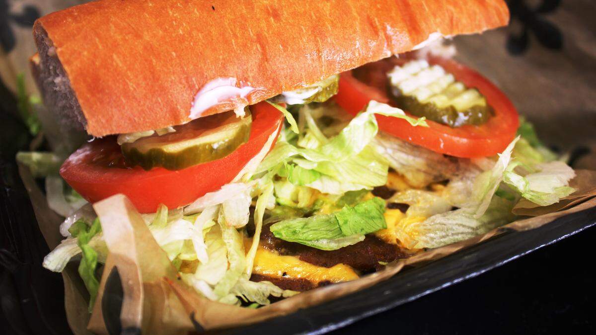 JULIAN BRUNT/SPECIAL TO THE SUN HERALDThe Hot Sausage Po-boy served at Taste of Bourbon is spicy and just right.