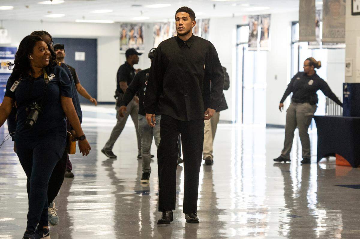 NBA star Devin Booker arrives at Moss Point High School for the retirement of Booker’s high school jersey in Moss Point on Saturday, Dec. 10, 2022.