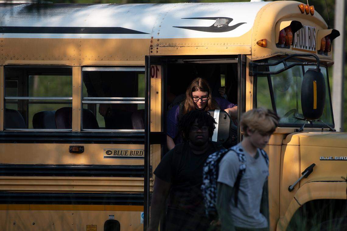Students arrive for the first day of school at Biloxi High School in Biloxi on Thursday, July 27, 2023.