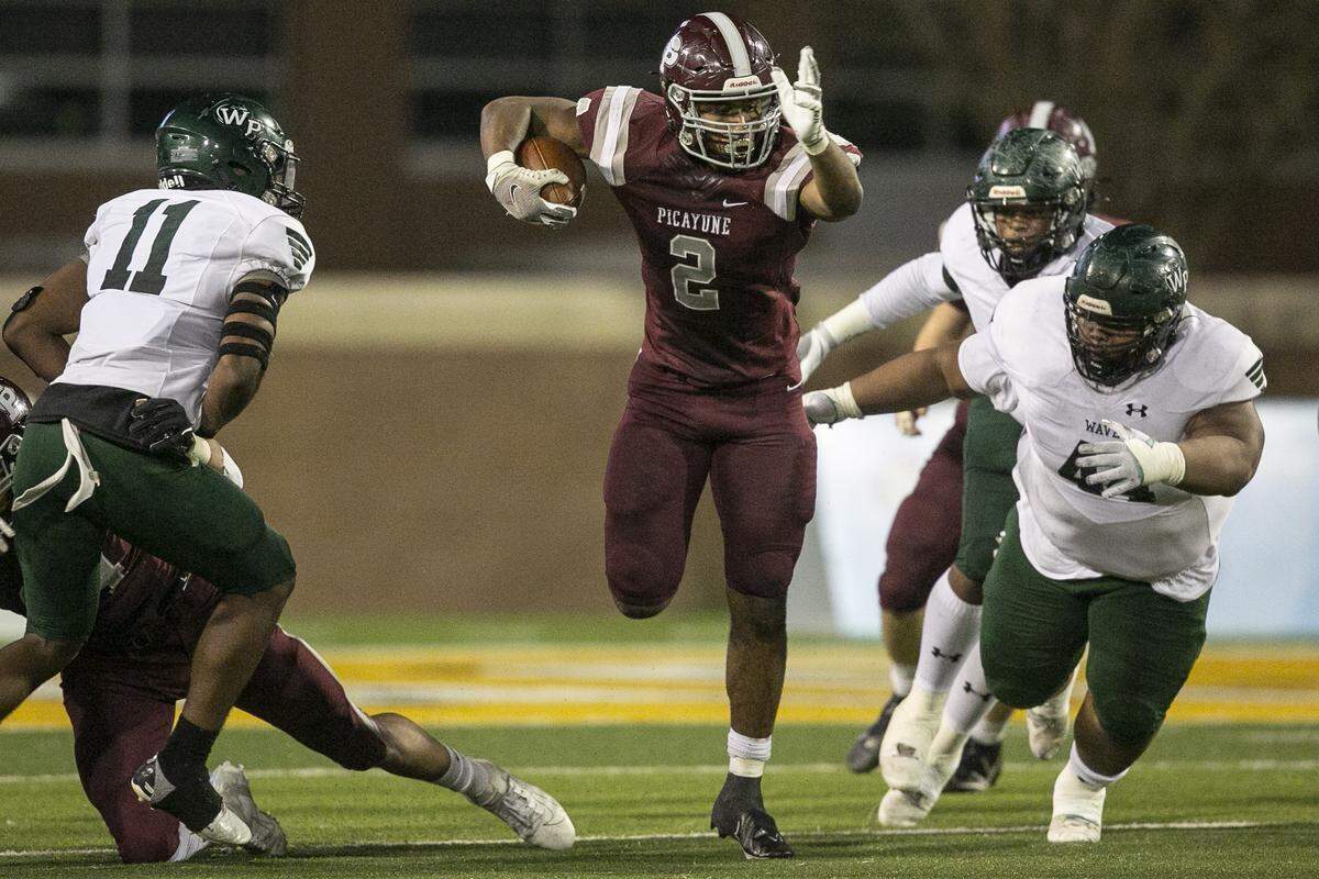 Picayune’s Dante Dowdell dodges around West Point during the 5A State Championship game at M.M. Roberts Stadium in Hattiesburg on Saturday, Dec. 4, 2021.
