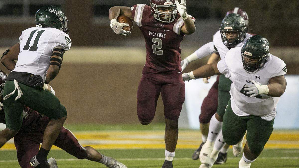 Picayune’s Dante Dowdell dodges around West Point during the 5A State Championship game at M.M. Roberts Stadium in Hattiesburg on Saturday, Dec. 4, 2021.
