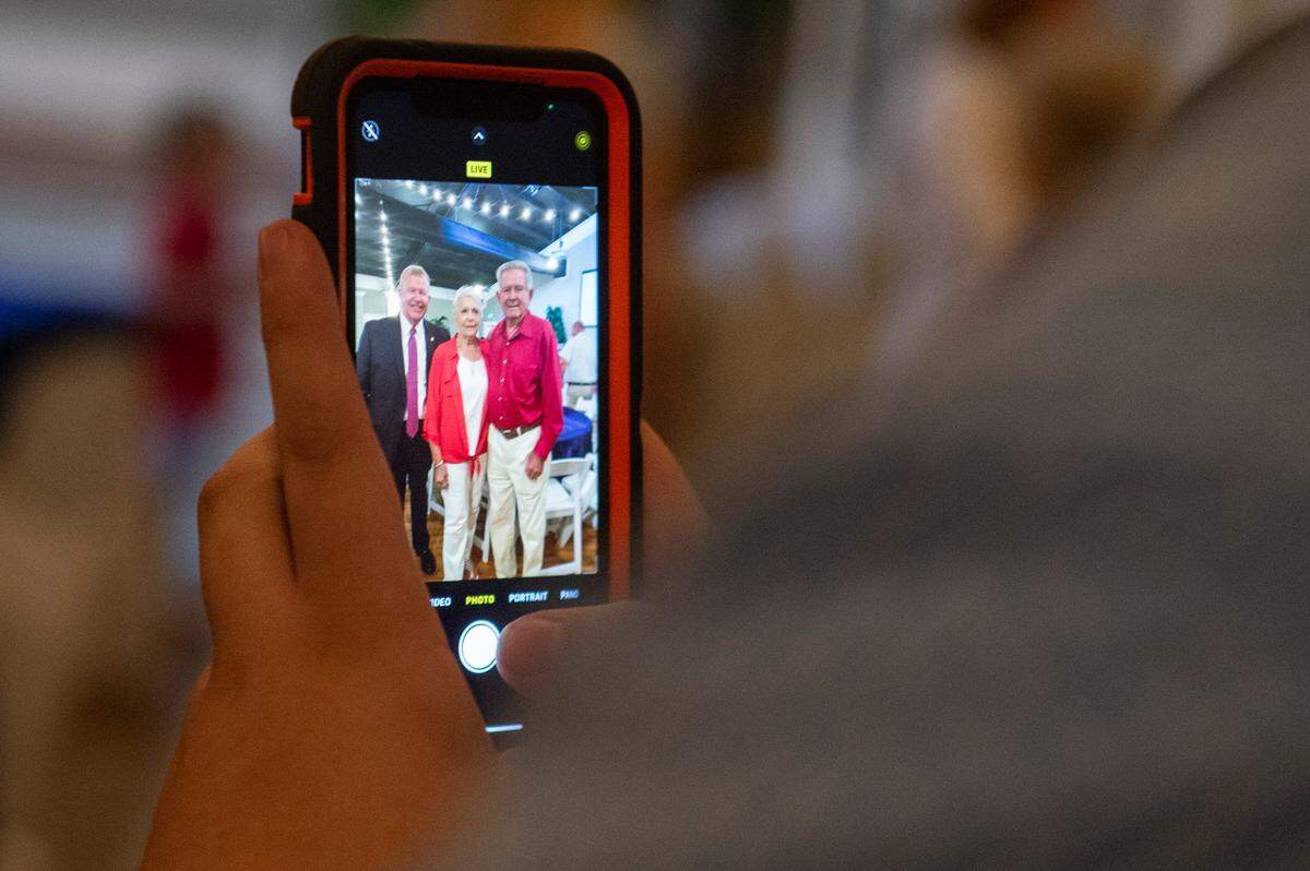 Sheriff Mike Ezell poses for photos with supporters after winning the primary runoff election for Mississippi’s 4th Congressional District at The Grand Magnolia Ballroom in Pascagoula on Tuesday, June 28, 2022.