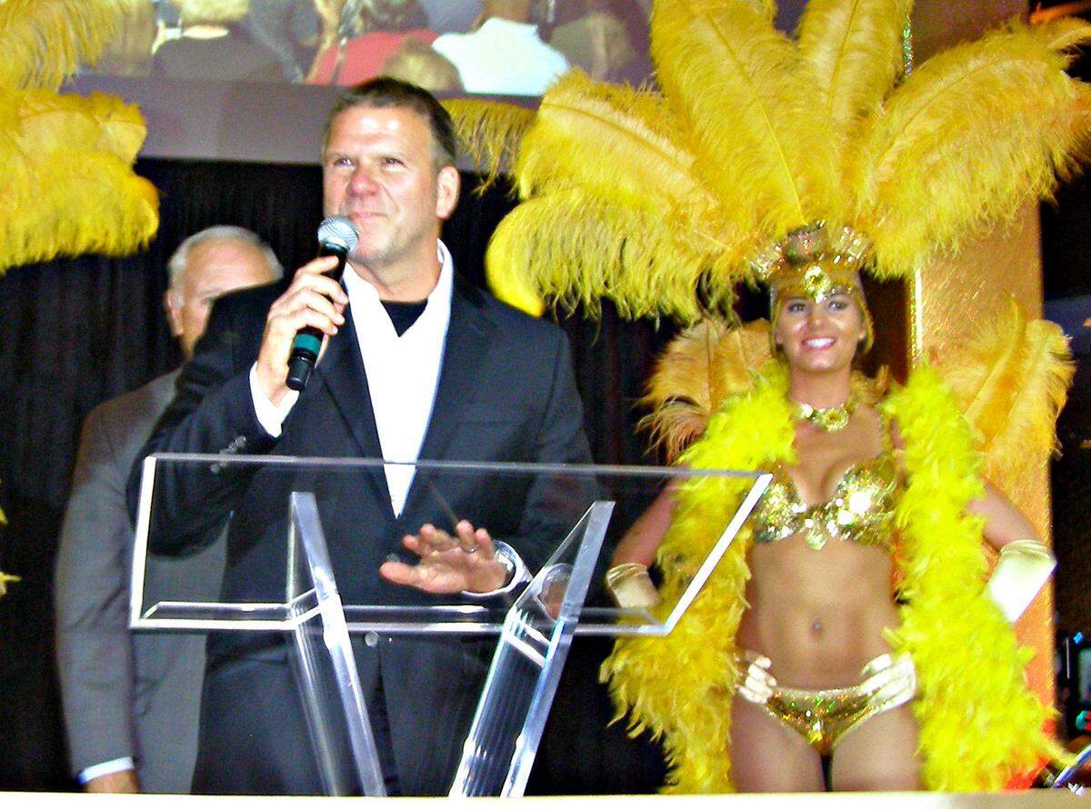 Tilman Fertitta speaks to the crowd during the ribbon cutting and re-branding of the Golden Nugget Casino Biloxi. in 2013. Fertitta Entertainment is buying Caesars Entertainment.