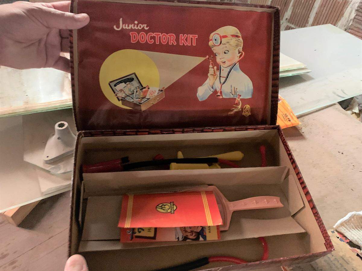 A doctor’s kit and other toys were discovered in the interior renovation of the Barq Building, perhaps played with by Biloxi children in an office waiting room.