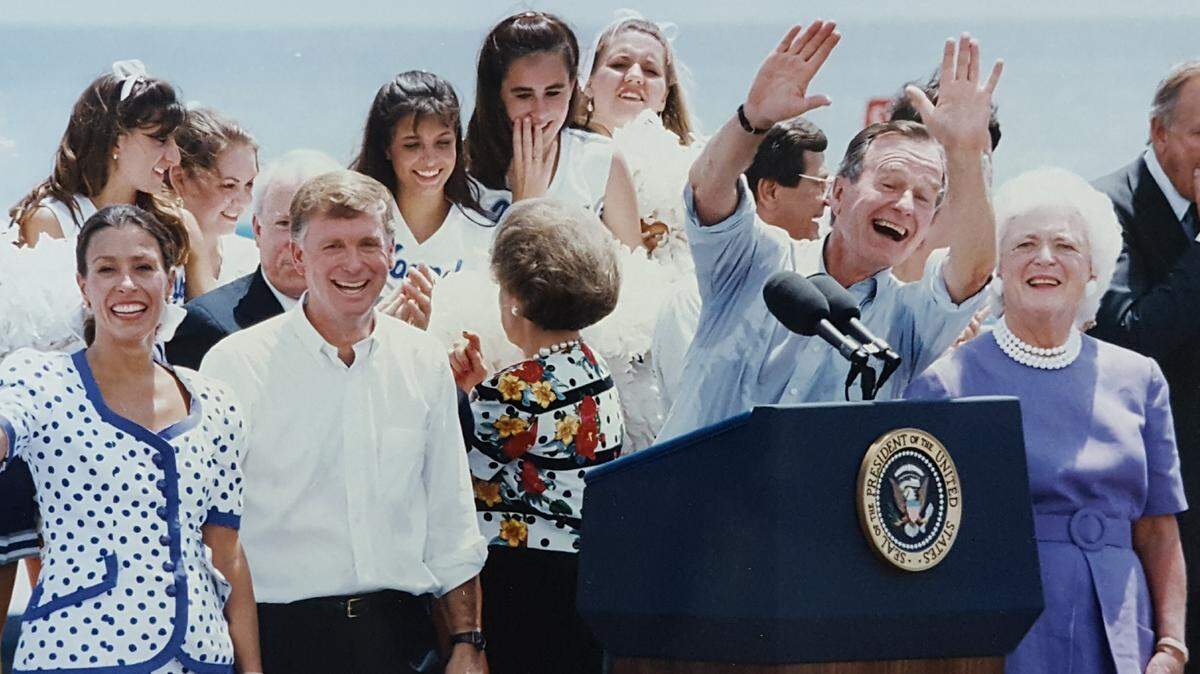 Sun Herald photographer David Purdy labeled this photo, ‘Hi Mom’ in 1992, when he covered the presidential rally in Jones Park in Gulfport. Purdy said it shows Bush’s enthusiasm under difficult circumstances -- the August heat.