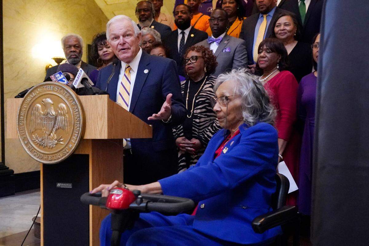 Former Mississippi State Rep. Alyce Clarke, D-Jackson, right, listens to comments offered by House of Representatives Speaker Pro Tempore Manly Barton, R-Moss Point, at the ceremony where Clarke’s official portrait was unveiled at the Mississippi State Capitol.
