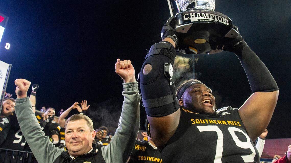 How did USM athletics overcome years of financial hardship, even with a small budget?