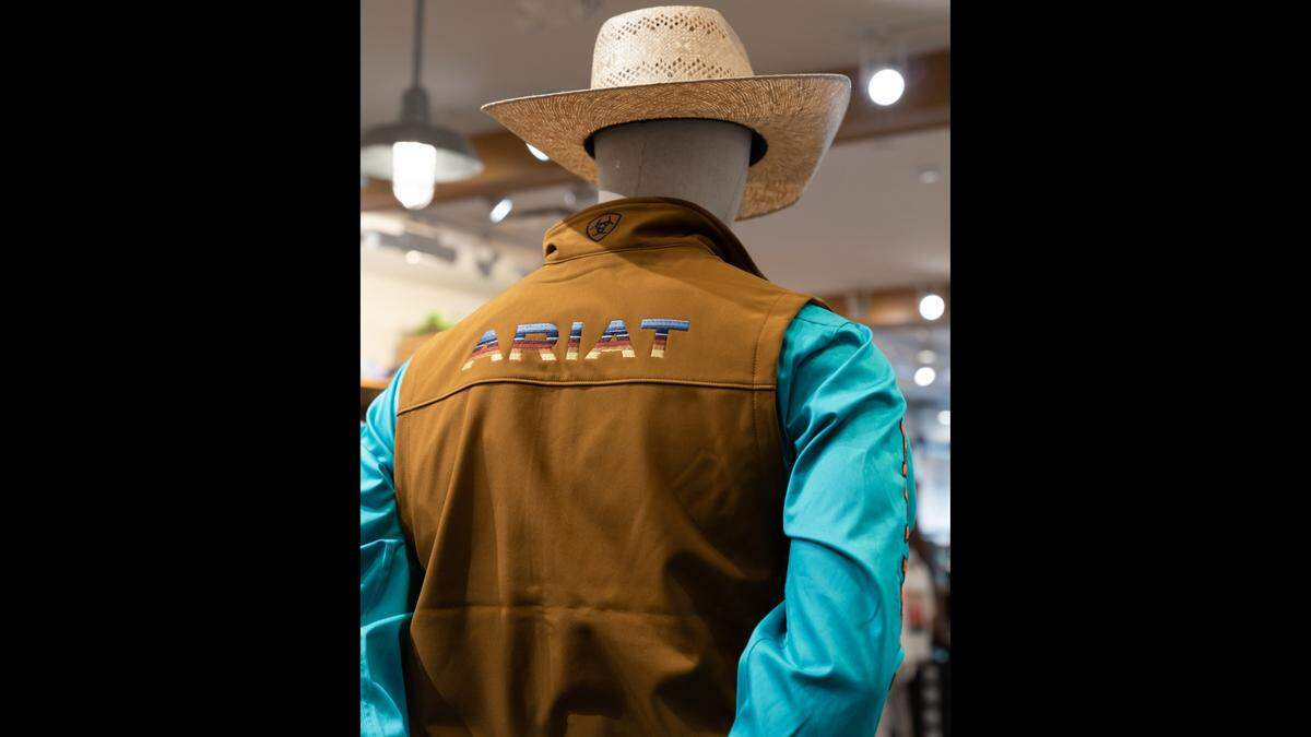 A Fresno brand vest is among the apparel at the new Ariat outlet at Gulfport Premium Outlets.