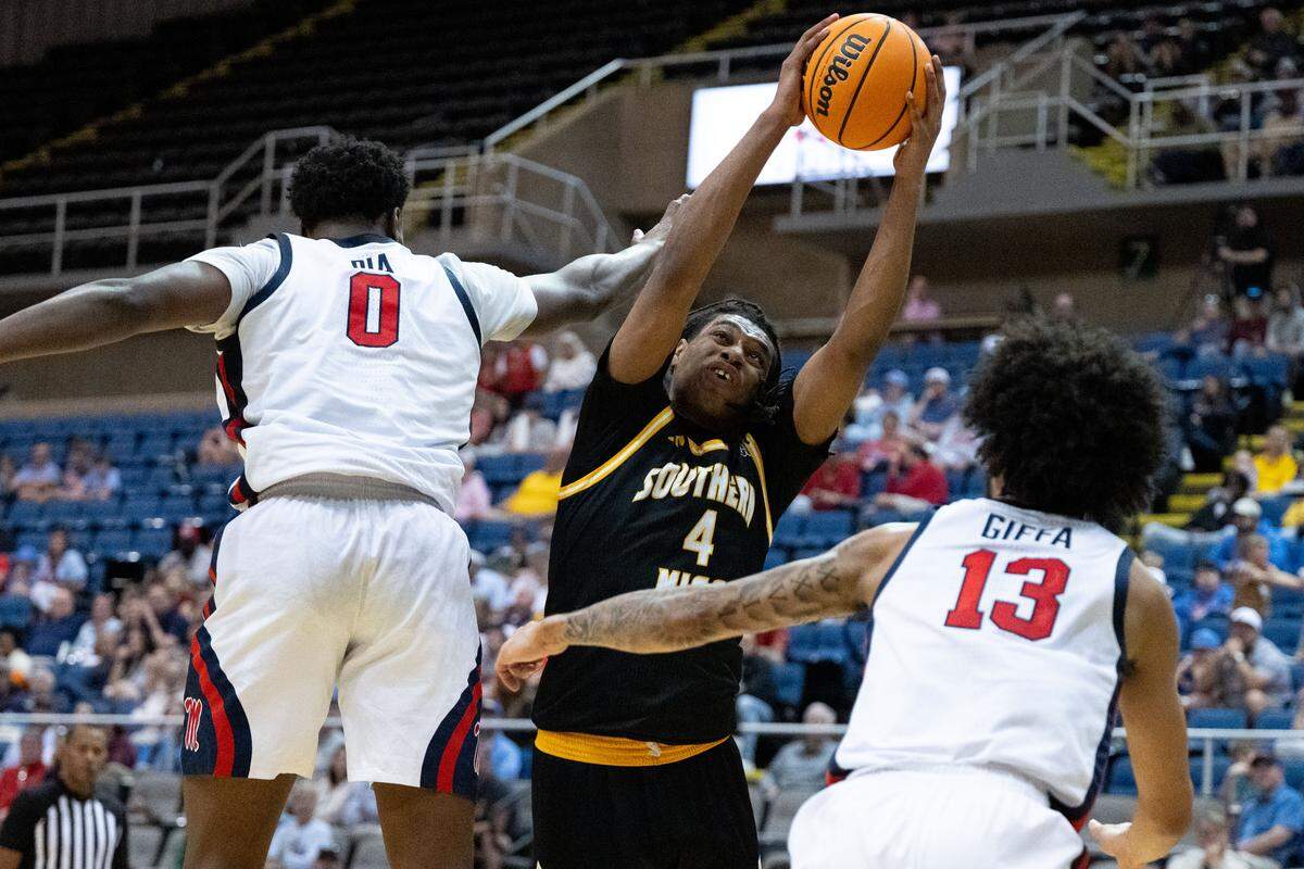 Southern Mississippi guard Chiante Tramble (3) recovers a rebound.