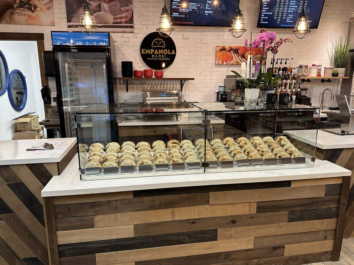 A variety of sweet and savory empanadas are on display at the Empanola Biloxi on Popp’s Ferry Road near Pass Road.