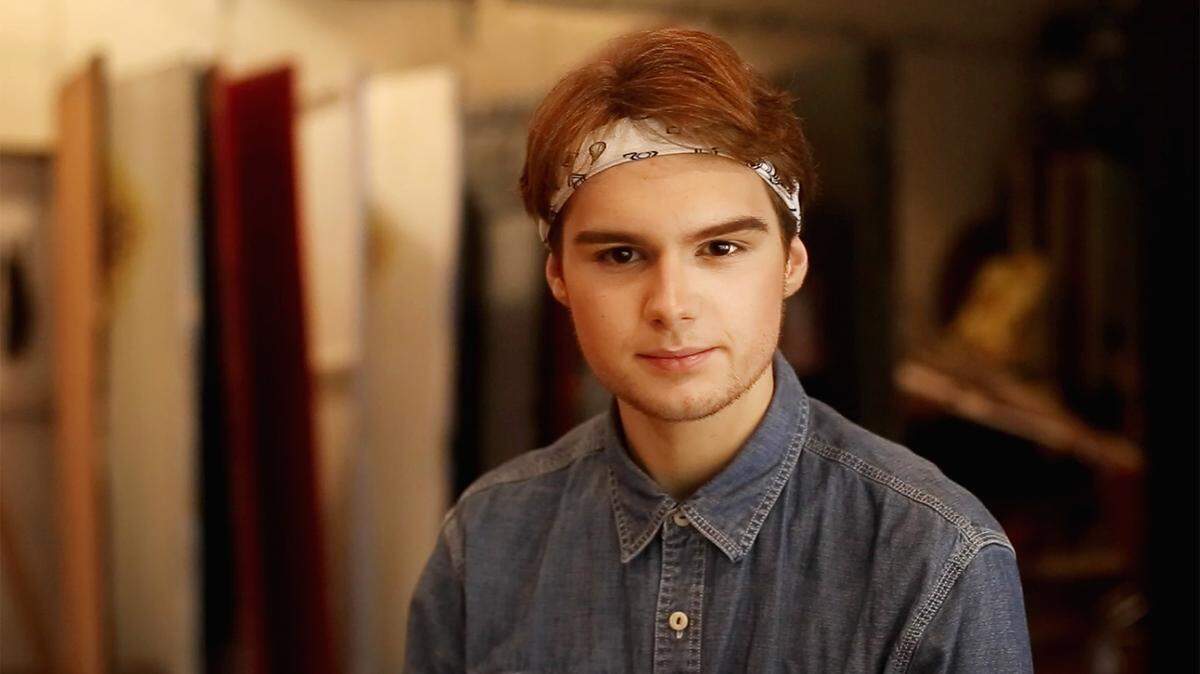 AMANDA McCOY/SUN HERALD 
 Hancock High senior Trevor Ladner is getting attention for a scholarship video he created and posted on YouTube. Ladner, who is one of the top students in his class, transforms in and out of drag in the video to express how he feels society places people into boxes, especially when it comes to gender roles.