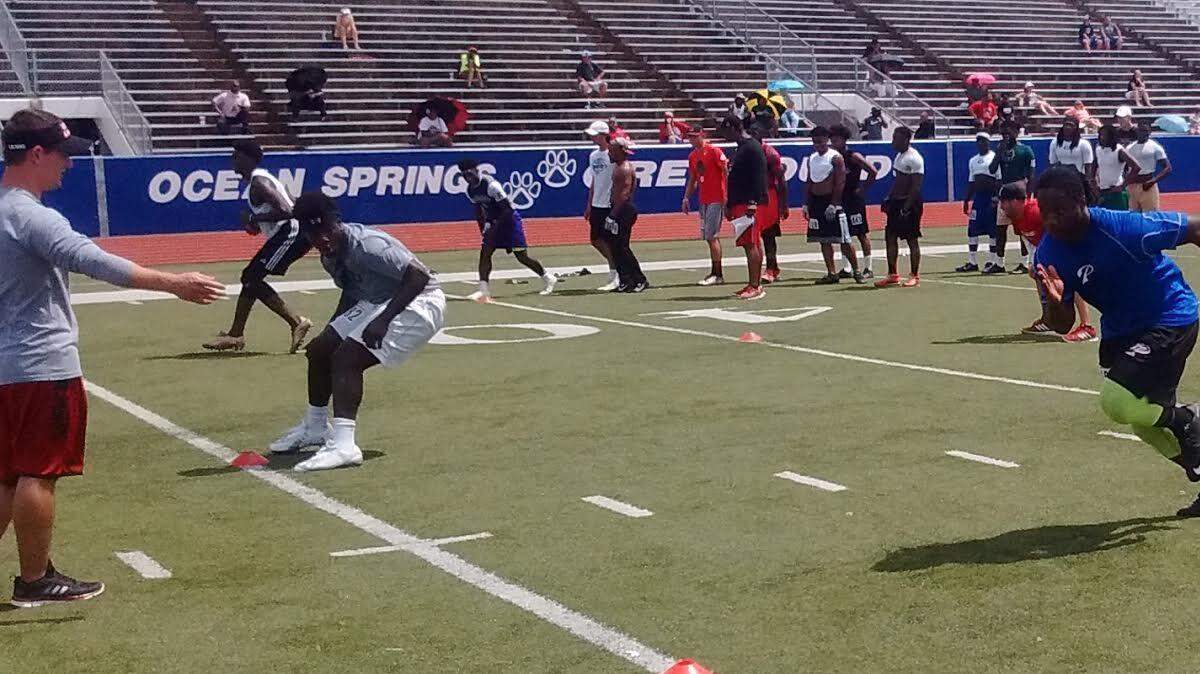Pascagoula running back Javarious Walker participates in a drill at Ocean Springs stadium Wednesday. Walker, who missed last year with a knee injury, was participating in a Louisiana-Lafayette football camp.