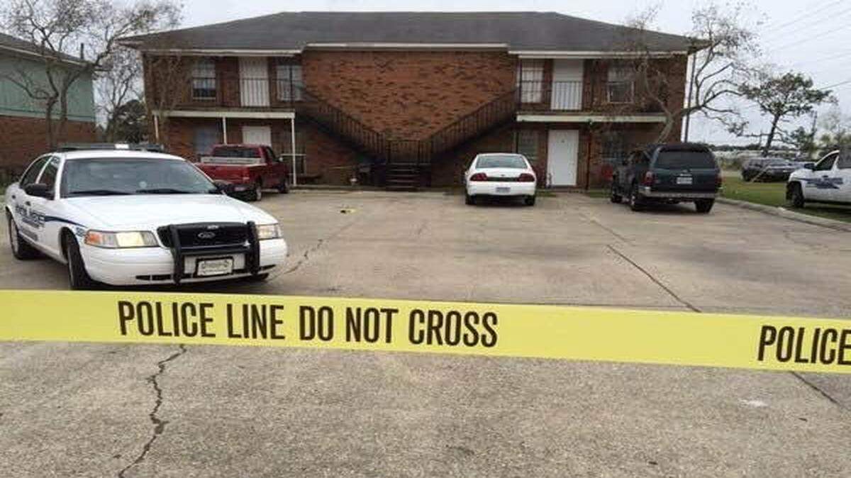 PHOTO COURTESY GULFPORT POLICE 
 Crime scene marks the area where two men were shot at an apartment complex in Gulfport on Thursday.