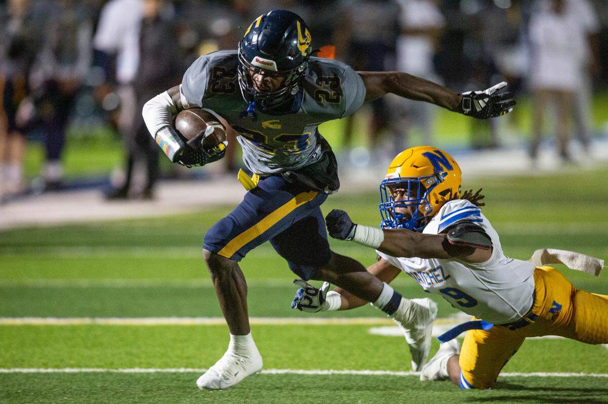 Gautier running back Latrell Pogue runs the ball during a 5A playoff game between Gautier and Natchez at Gautier High School on Friday, Nov. 15, 2024.