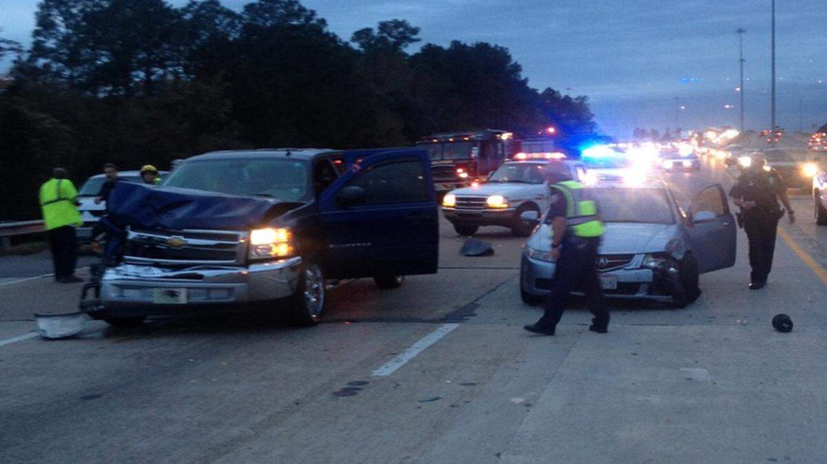 GULFPORT FIRE DEPARTMENT 
 Firefighters and police work the scene of a wreck on Interstate 10 Tuesday afternoon.