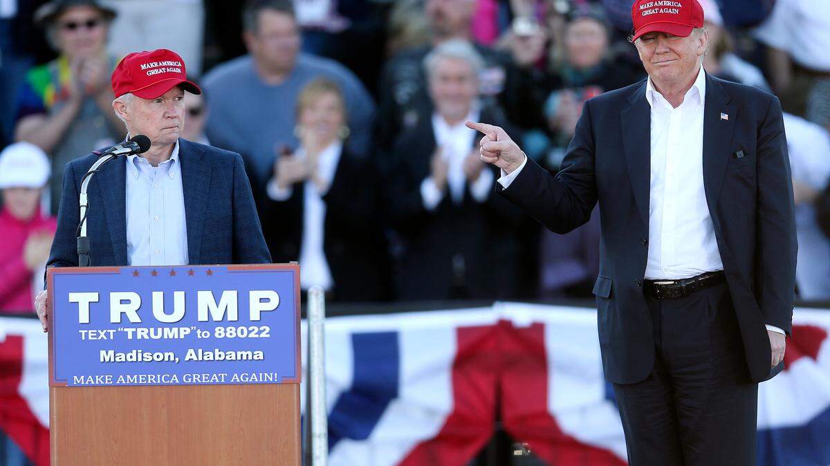 Republican presidential candidate Donald Trump, right, gestures as Sen. Jeff Sessions, R-Ala., speaks during a rally, Feb. 28, 2016, in Madison, Ala. Republican presidential candidates will gather in Alabama on Wednesday, Dec. 6, 2023, for the fourth GOP debate of the 2024 presidential campaign. (AP Photo/John Bazemore, File)