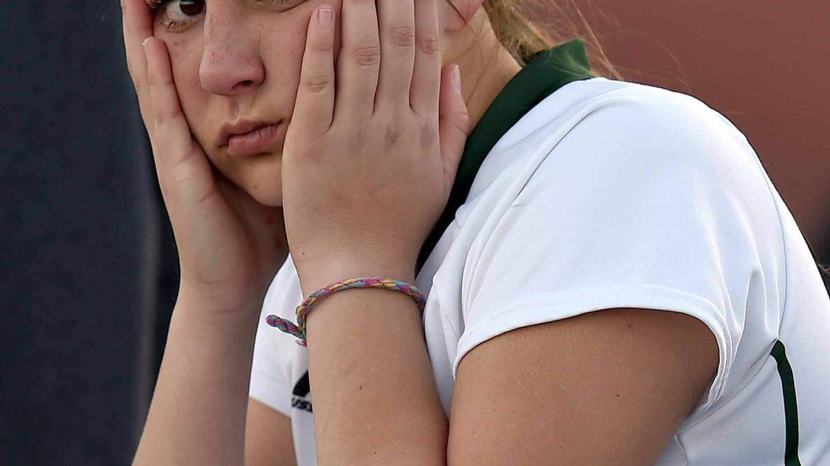 CHRIS TODD/SPECIAL TO THE SUN HERALD 
 West Harrison's Savannah Ellis holds her face on the bench while watching the action after taking a ball to the head on Saturday, February 6, 2016, at the MHSAA Soccer Championships at Madison Central High School in Madison, Miss.