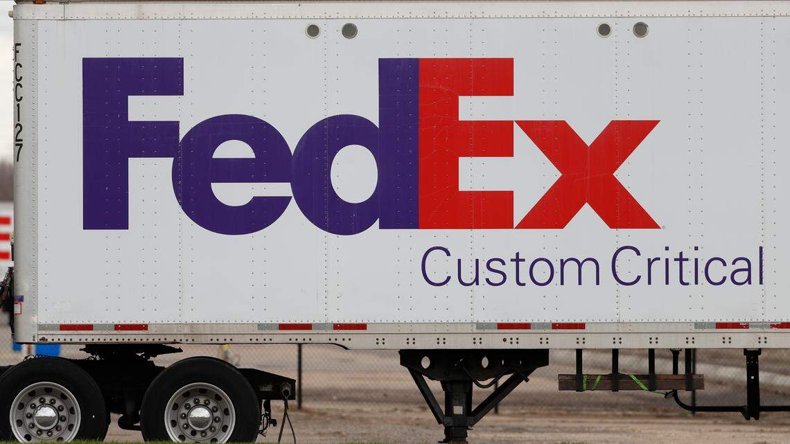 FILE - This April 1, 2020, file photo shows a FedEx logo at a facility in Romulus, Mich. A FedEx worker was killed Feb. 18 in an accident at a hub in Tennessee, news outlets say. (AP Photo/Paul Sancya, file)