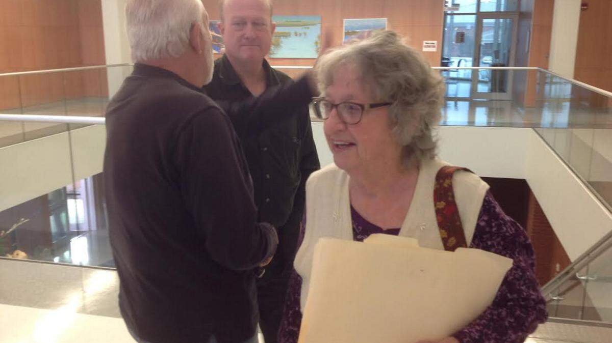 Coast Sierra Club Chairman Steve Shepard, background, and Maxine Ramsay urged the Jackson County supervisors to no longer support the Lake George project.