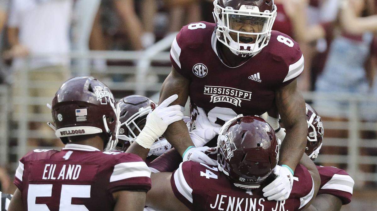 Mississippi State running back Kylin Hill (8) celebrates his 53-yard touchdown pass reception against Stephen F. Austin on Sept. 1 in Starkville.