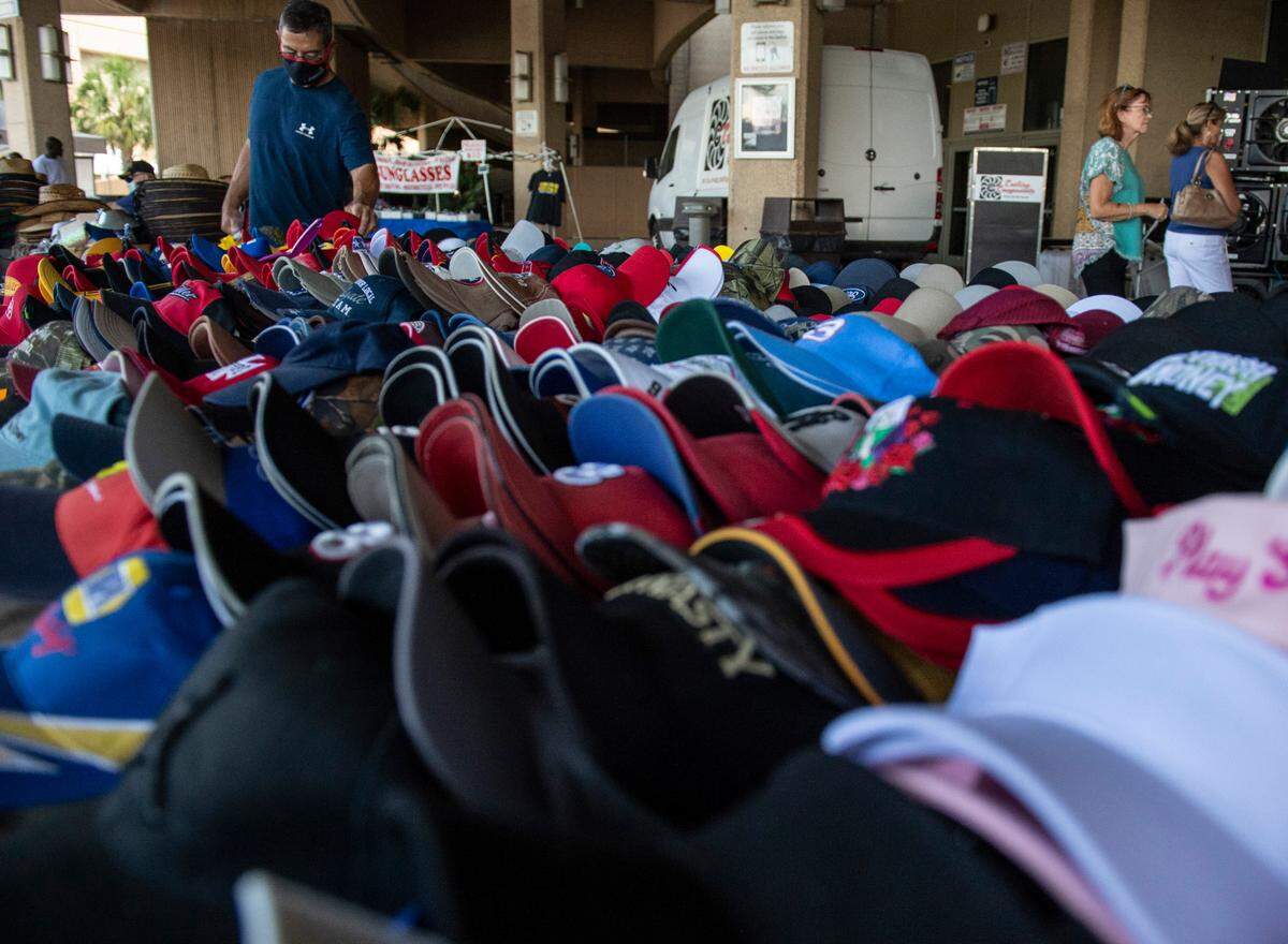 Hats for sale at the Cruisin’ The Coast Swap Meet at the Mississippi Coast Coliseum on Thursday, Oct. 7, 2021.