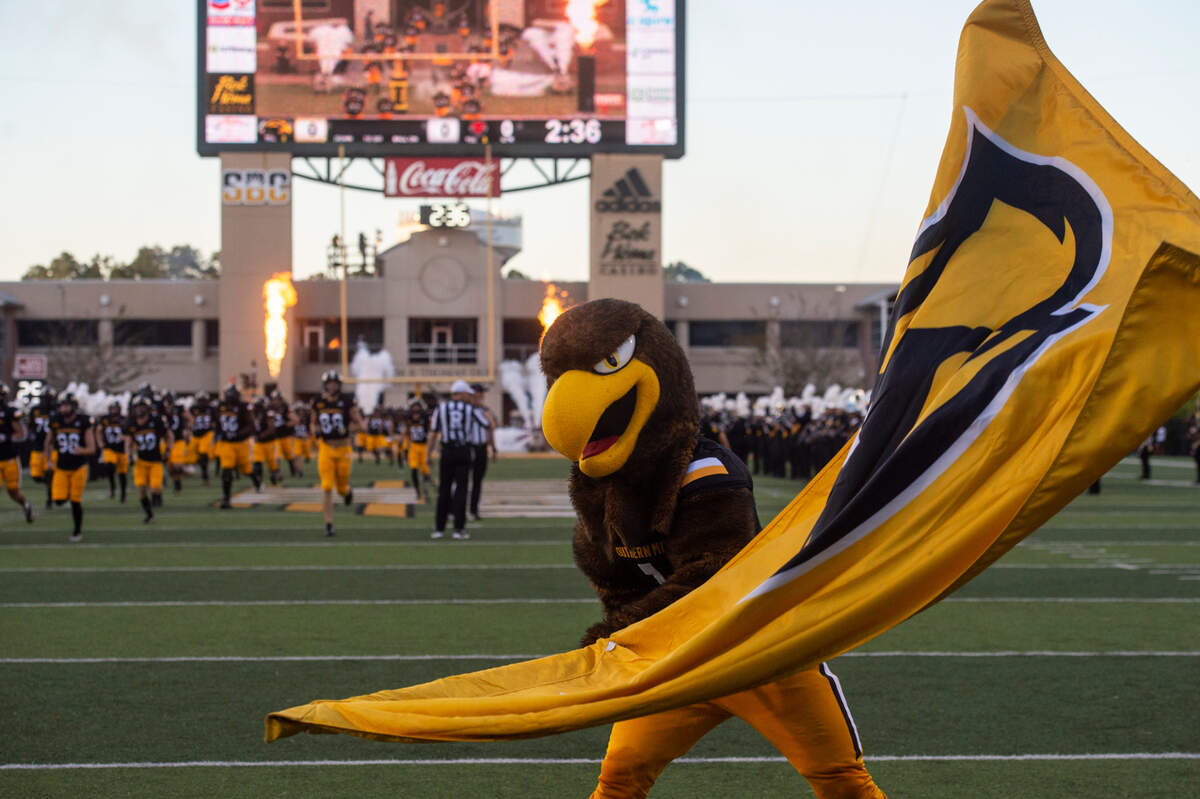 The Southern Miss Golden Eagles mascot waves a flag before a game against Arkansas State at M.M. Roberts Stadium in Hattiesburg on Saturday, Oct. 15, 2022.