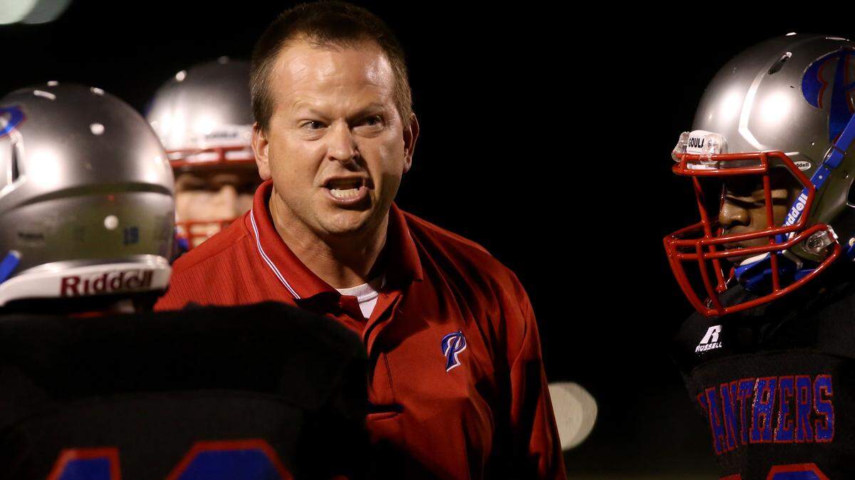 AMANDA McCOY/SUN HERALD 
 Pascagoula coach Lewis Sims yells at his team after they failed to stop the kick from crossing the goal line against Picayune on Friday, October 30, 2015, at Pascagoula High.