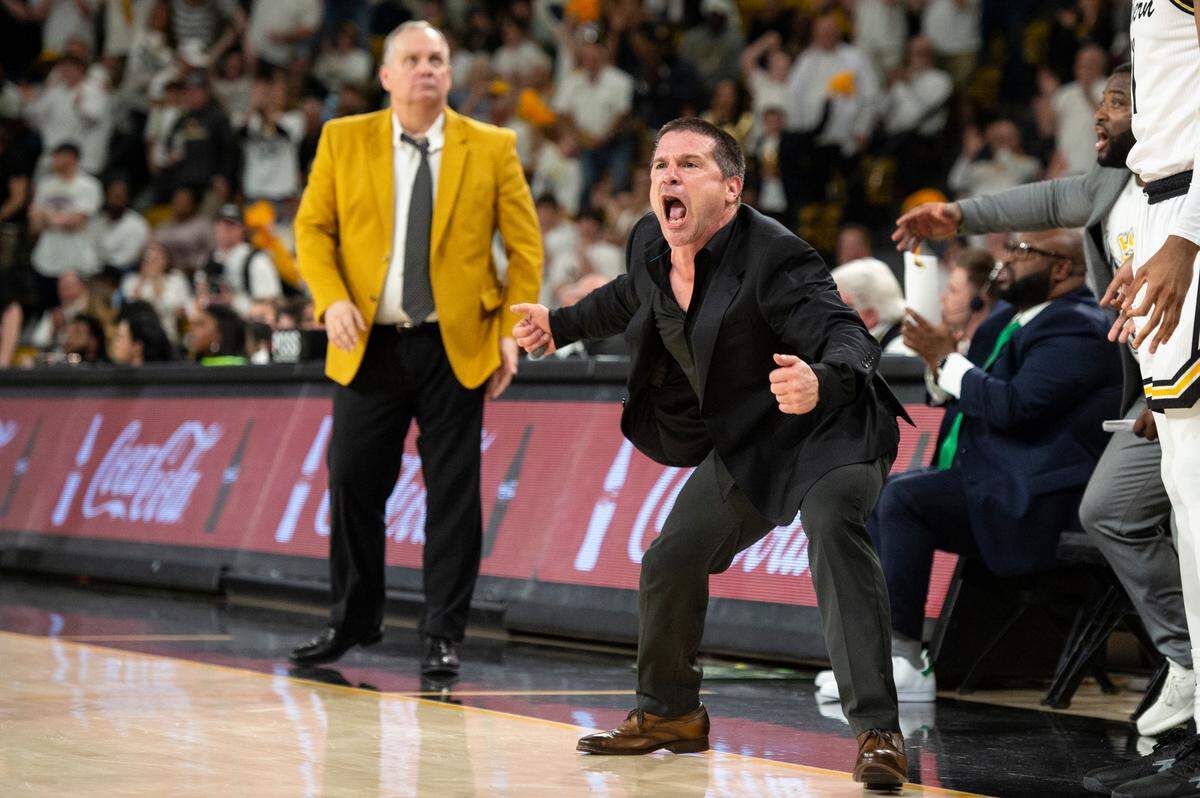 Southern Miss Assistant Coach Juan Cardona yells from the sidelines during a game against Louisiana-Lafayette at Reed Green Coliseum on Thursday, Feb. 9, 2023.
