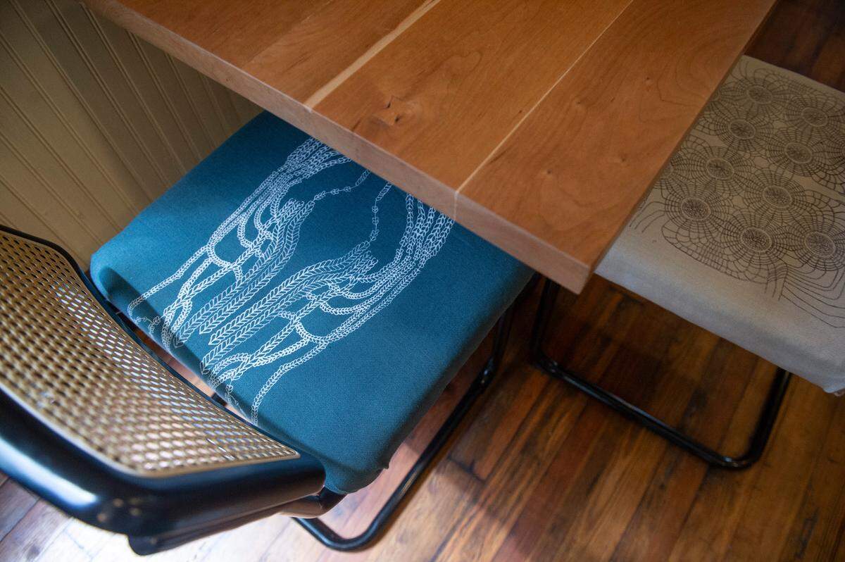 Chair cushions at The Traveler, a new extension to the Walter Anderson Museum of Art, feature designs from Caroline Masue Muneoka, one of Walter Anderson’s great grandchildren.