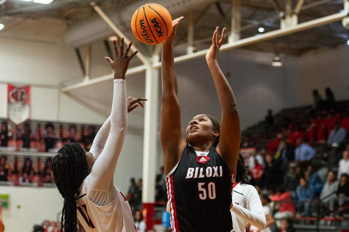 Biloxi’s Zaniya Johnson blocks a shot during a game against Harrison Central at Harrison Central High School in Harrison County on Tuesday, Dec. 12, 2023.