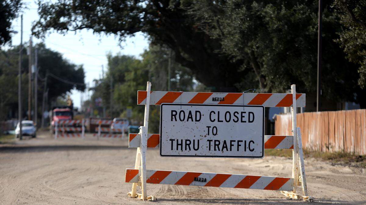 AMANDA McCOY/SUN HERALD 
 A section of Lameuse Street in Biloxi is closed for infrastructure work on Wednesday, October 21, 2015. The contract Biloxi has with HNTB Corporation, the firm overseeing the $365 million infrastructure program, will run out early next year unless FEMA agrees to add more money.
