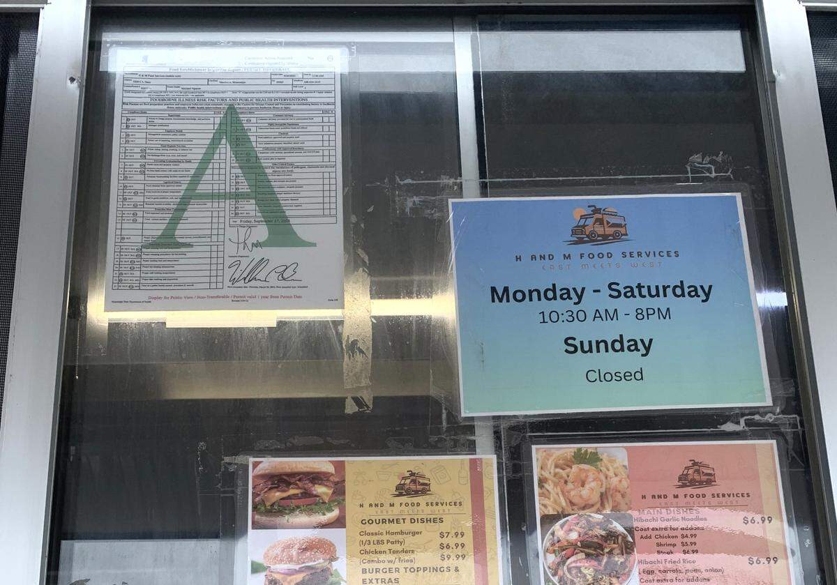 A big "A" score from the Mississippi Health Department is displayed in the window of the H and M Hibachi and Burger food truck in Vancleave. Food trucks generally have to meet the same requirements as brick and mortar restaurants in Mississippi.