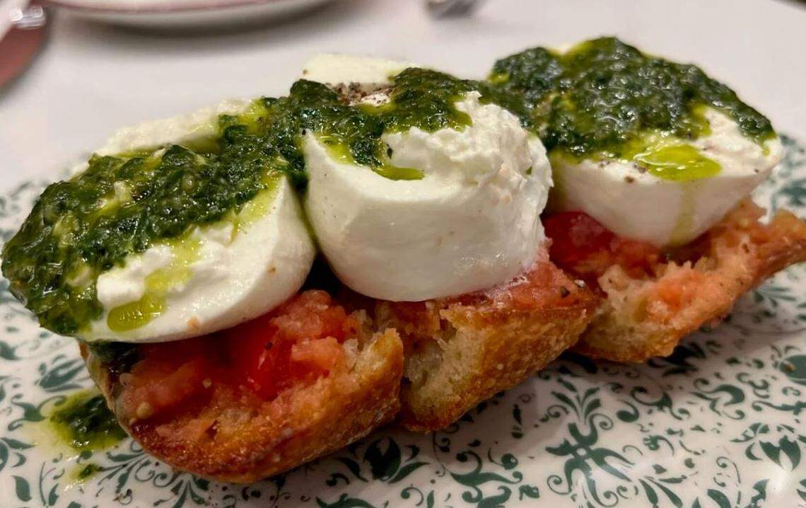 Burrata on tomato toasts starts at meal at Emeril’s Brasserie (Staff photo by Ian McNulty, NOLA.com | The Times-Picayune)