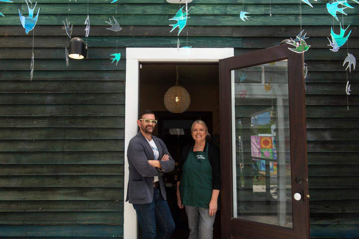 Julian Rankin, executive director of the Walter Anderson Museum of Art, left, and Jeanette Wright, manager of The Traveler, stand in the doorway of The Traveler, a new extension to the Walter Anderson Museum of Art, in Ocean Springs on Wednesday, April 16, 2025.