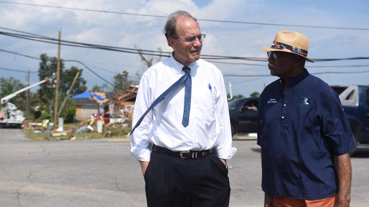 Lt. Gov. Delbert Hosemann, left, and Moss Point Mayor Billy Knight assess damage left behind by a June 19 tornado on Wednesday, June 21, 2023.