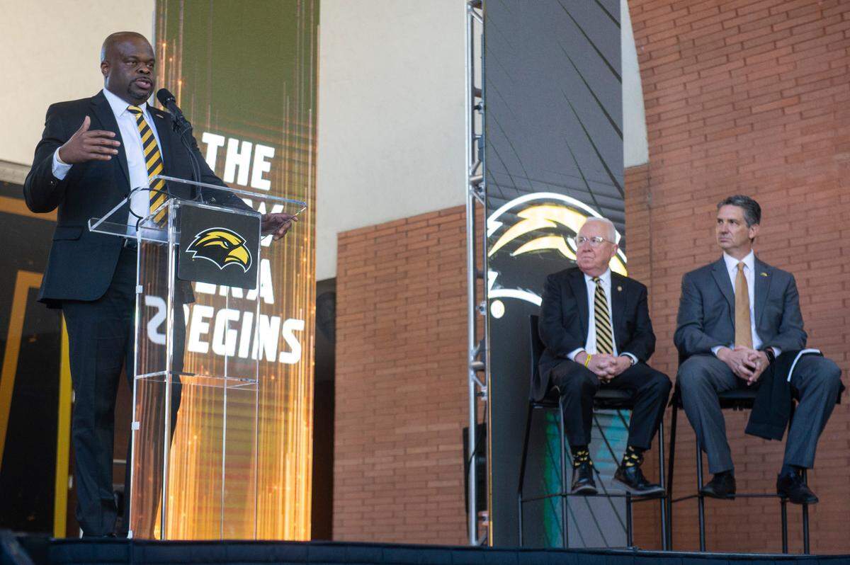 Southern Miss’ new head football coach Charles Huff makes an introductory speech during a public welcome celebration for Huff at The Rock in Hattiesburg on Thursday, Dec. 12, 2024.