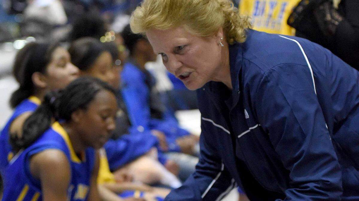 CHRIS TODD/SPECIAL TO THE SUN HERALD 
 Bay High head coach Debbie Triplett explains her strategy to the Lady Tigers during a time out on Thursday, March 3, 2016, in the MHSAA state basketball tournament quarterfinals at the Lee E. Williams Athletics & Assembly Center on the Jackson State University campus in Jackson, Miss.