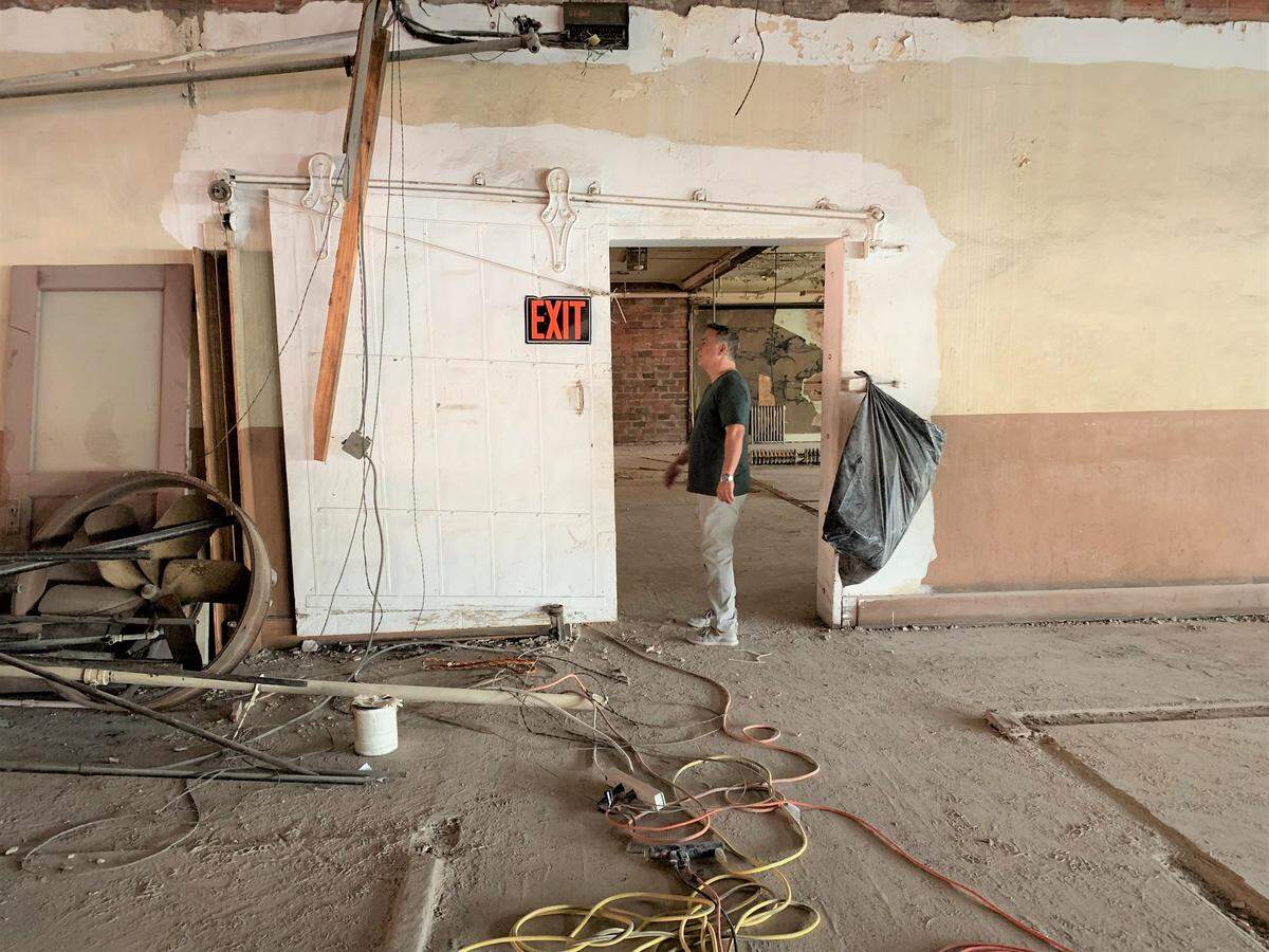 A massive fire door between sections of the Barq Building in downtown Biloxi is one of the architectural elements that will remain during the restoration. Other finds will be included in a lobby display or used elsewhere in the block-long building.