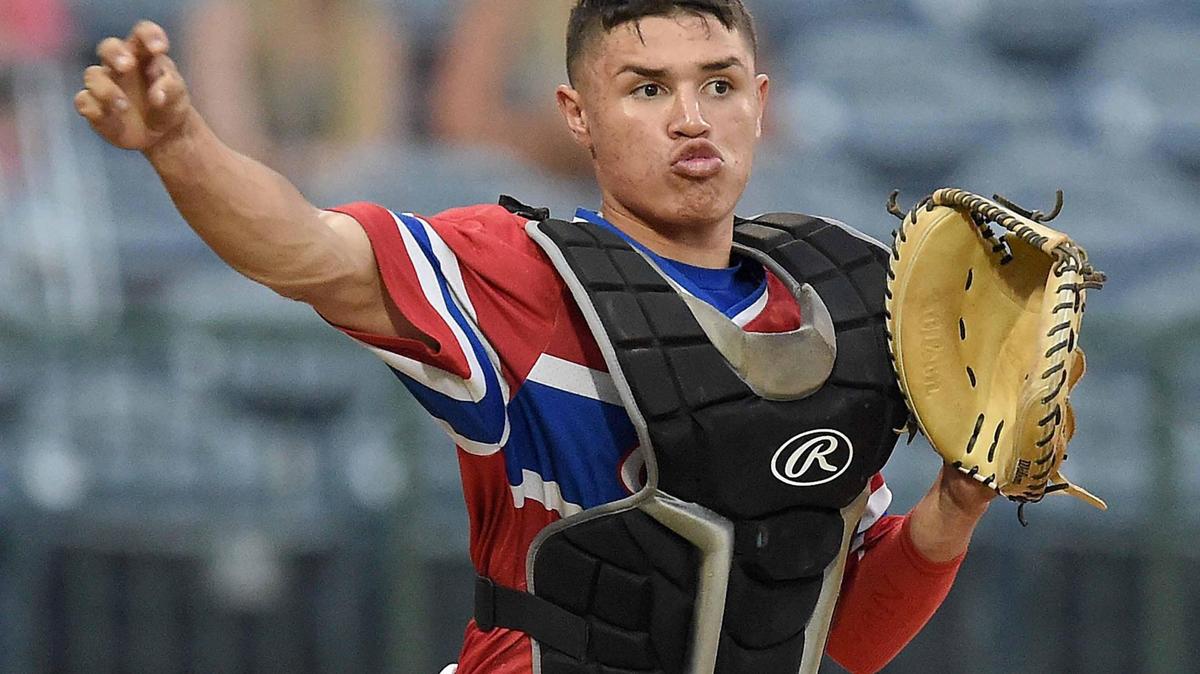 Pascagoula catcher Francisco Solivan throws out a Saltillo hitter at the MHSAA State Baseball Championships at Trustmark Park in Pearl, Miss., on Tuesday, June 1, 2021.