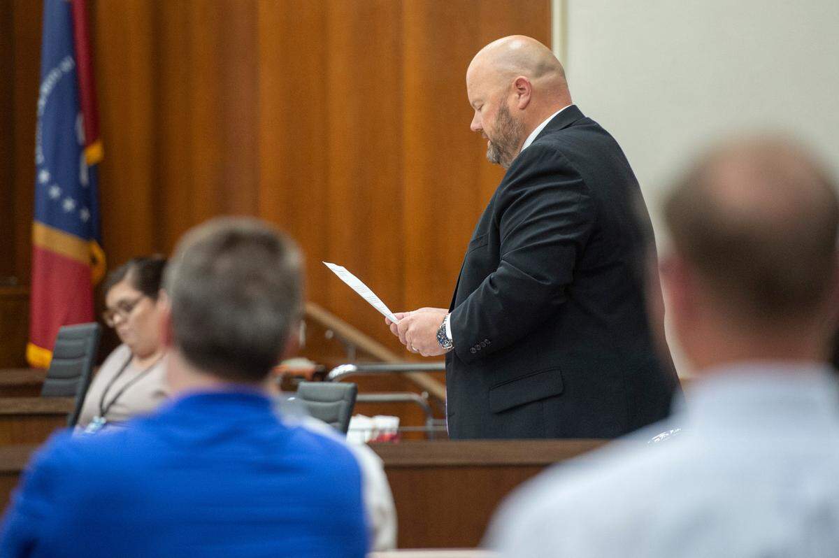 Assistant district attorney George Huffman reads a victims impact statement by the son of Jennifer Reis during a court appearance in which Michael Reis pled guilty to killing Jennifer Reis in Harrison County Court on Thursday, Sept. 15, 2022.