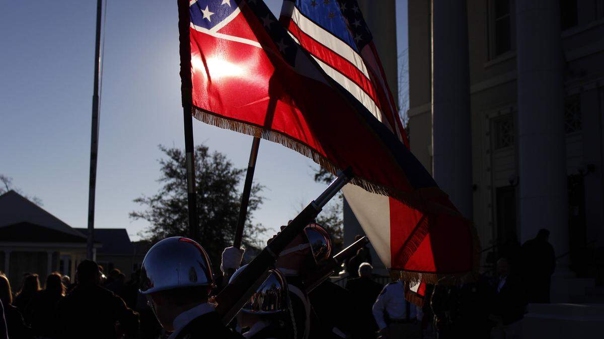 WESLEY MULLER/SUN HERALD 
 Hancock High School's color guard stands in front of circuit court during Monday's swearing-in ceremony for the county's elected officials.